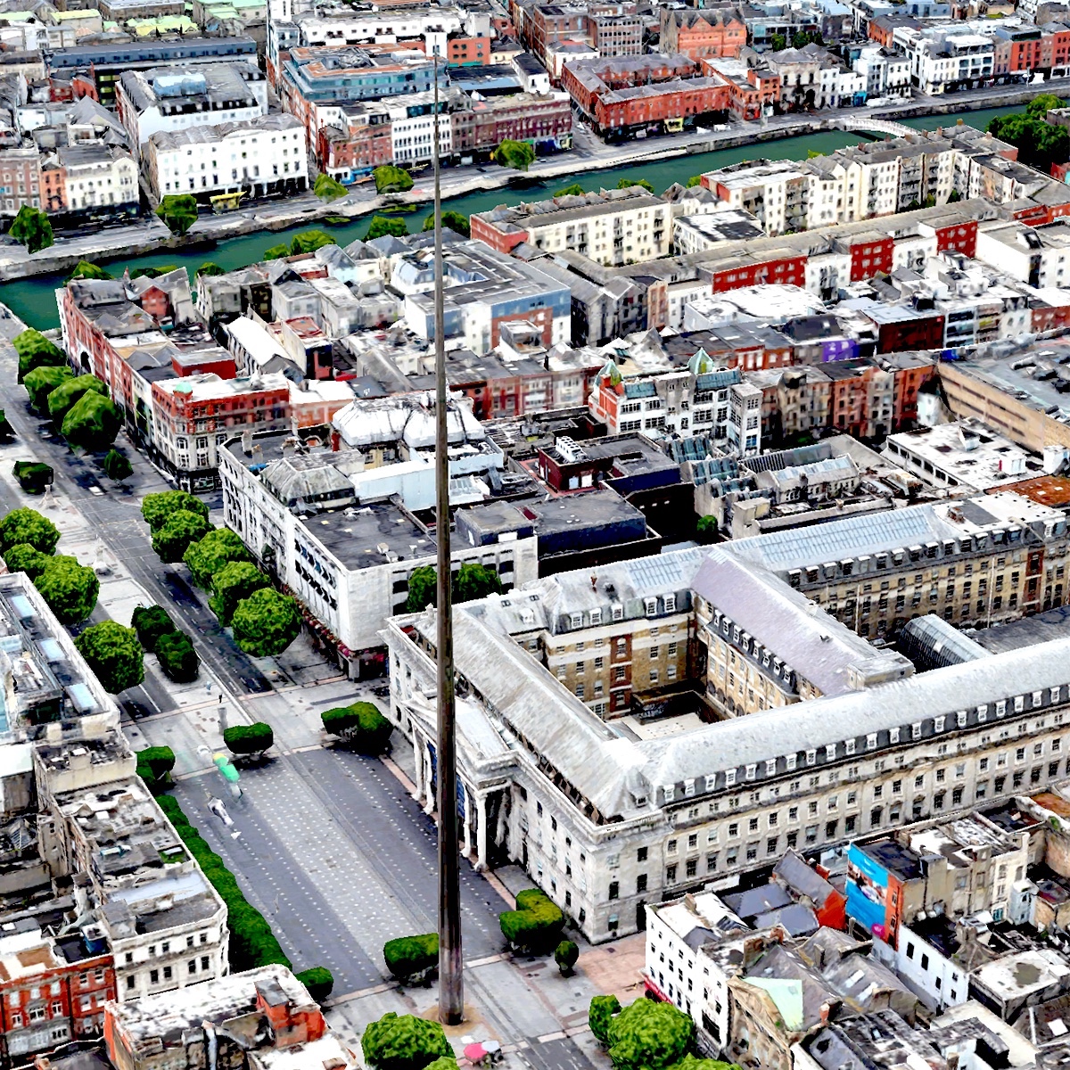 This is a photo taken from a high point. You look out over a city with all blocks of houses.